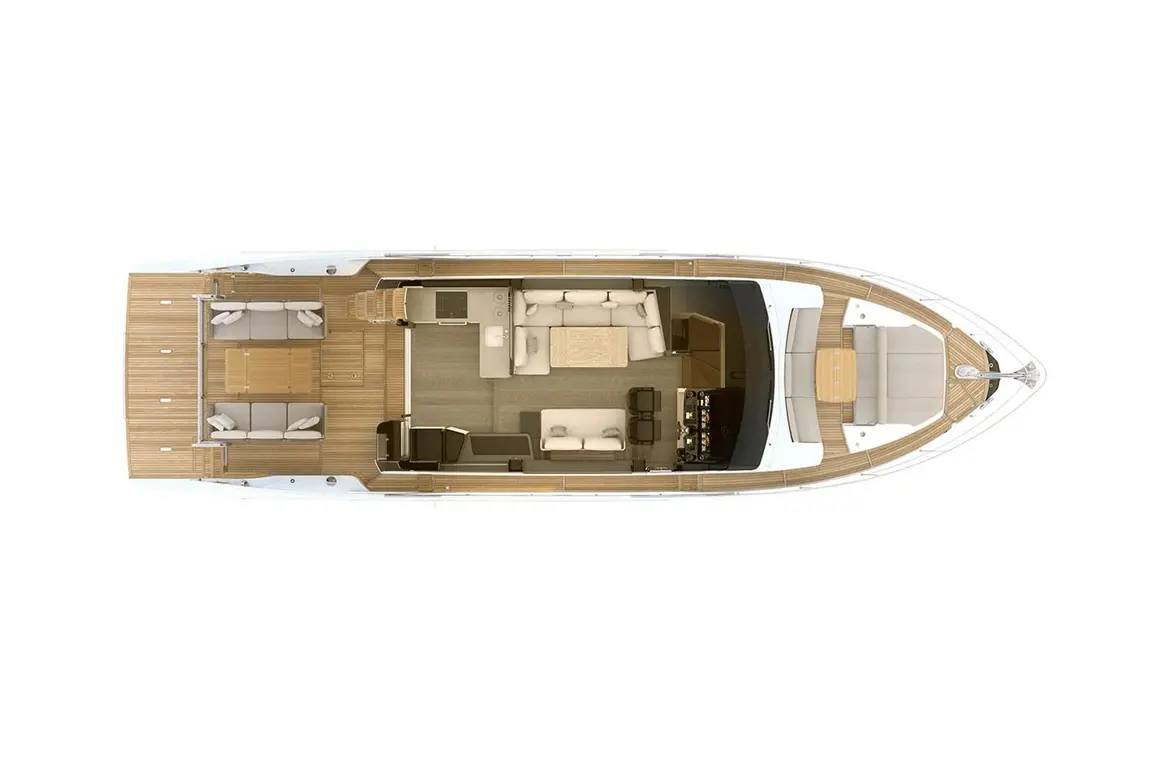 Top view of a modern boat's interior featuring lounge seating, a dining area, and a kitchenette with a control panel.